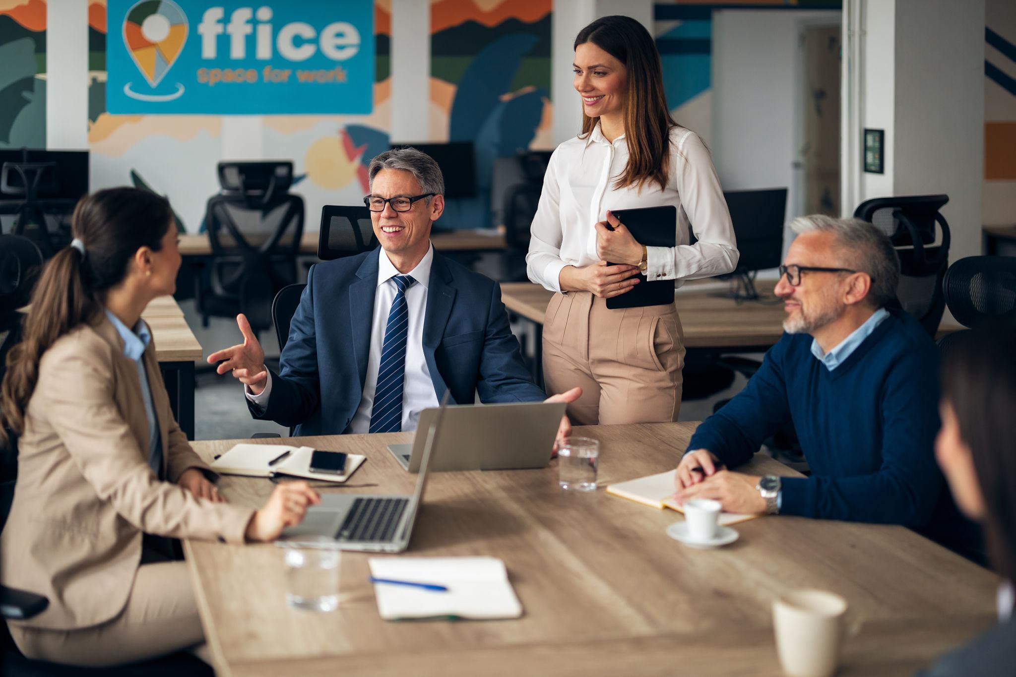 Casual office setting, meeting